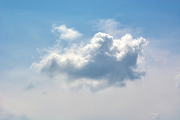 A beautiful, lonely, fluffy cloud in the blue sky