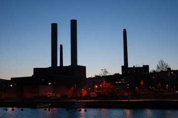 Silhouette of industrial landscape with chimneys tank by the sea in Helsinki, Finland
