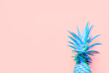 Creatively toned pineapple at the coral solid drop with place for text in glitch technique. Trendy modern colorful background. Horizontal