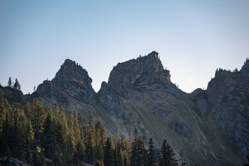 Jagged mountain peaks at sunrise in the Alpine Lake Wilderness. Central Cascade mountain range, Washington State, July 2019. Hibox Mountain.