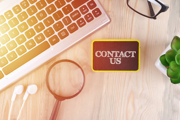 Business and Technology Concept with text on black sign