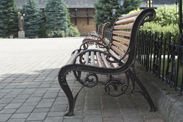 Bench In A Holiday Park On The Pavement