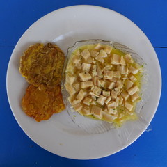 Calamari with garlic and patacones on the island San Andres in Colombia