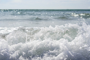 Sea waves. Close up photo of water splashes . Nature colors