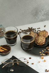 cup of coffee with cookies and sugar