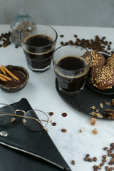 cup of coffee with cookies and sugar