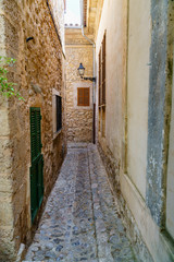 Fototapeta na wymiar Narrow alley in mediterranean touristic destination Valldemossa, Majorca
