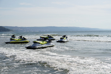 Scooters in the sea. Aquatic sport. Beach entertainment