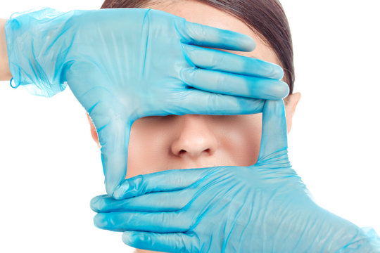 Woman is preparing for nose surgery, white background