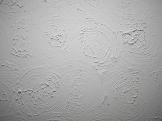 Swirly patterned ceiling plaster pattern known as Artex was common in the 80s.