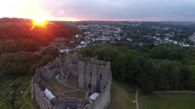 Editorial Swansea, UK - July 14, 2019: Sunset at Oystermouth Castle, a Norman stone castle in South Wales overlooking Swansea Bay on the east side of the Gower Peninsula.