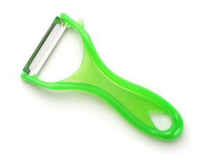Top view of green plastic vegetable peeler