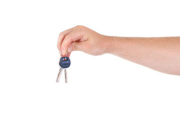 The keys to real estate in the hands of men on a white background
