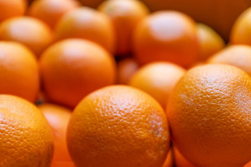 Close up of many bright orange citrus orange texture