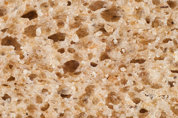 Black classic bread in a cut close-up, macro