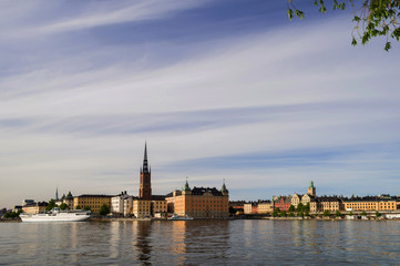 Naklejka premium View of Riddarholmen and Gamla Stan from the side of Lake Mälaren. Stockholm, Sweden.