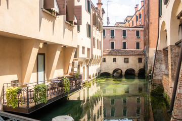 Fototapeta na wymiar The Buranelli canal in downtown Treviso, Italy