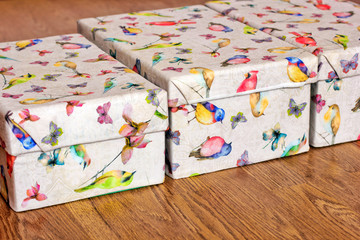 Gifts on wooden background. Gifts close up