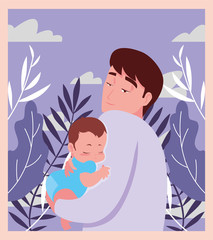 dad carrying his baby in his arms