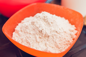 A simple recipe for pancakes - closeup of a deep bowl of flour