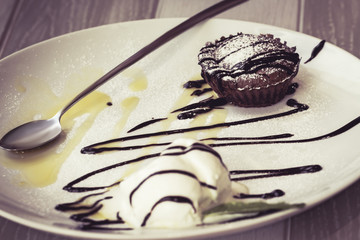 hot chocolate pudding, fondant with hot chocolate with vanilla ice cream ball