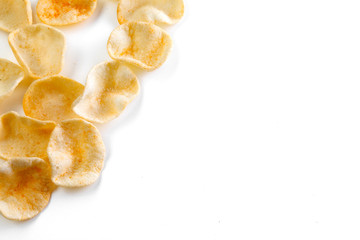 Potatoes snack with pepper on isolated white background. Closeup