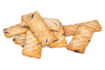 Layered biscuits with raisins coated in sugar. Isolated on white background.
