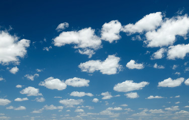Bright beautiful blue sky with clouds for background or texture