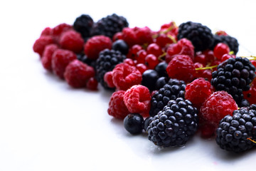 Assortment of ripe berries isolated on white