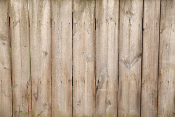 Textured brown old wooden plank background.