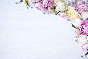 Floral background with peonies with space for text.