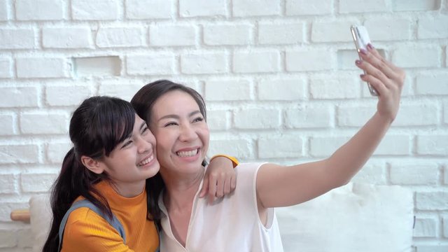 Family concept video,Southeast Asian mother and daughter are happy selfies