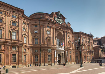 Fototapeta na wymiar Turin, Italy, 27 June 2019: Facade of the Carignano Palace in Turin,