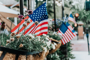 american flags in front of building