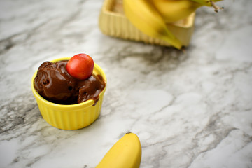 Chocolate Ice-cream with banana background