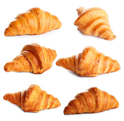 Set of delicious fresh baked croissants on white background. French pastry