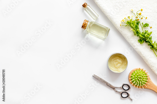 Download Bottle With Jojoba Argan Or Coconut Oil Styling Comb For Hair Style On White Background Top View Mock Up Wall Mural 9dreamstudio