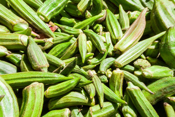 Green organic vegetables sell, Clemson Spineless Okra, Abelmoschus esculentus, with strong sunlight, in Street market in Guanabano Bridge in La Baralt Avenue, Caracas, Venezuela.