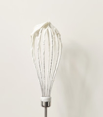 Wire whisk with cream