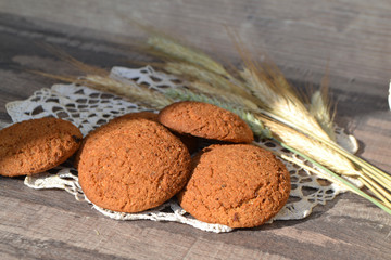 Group of homemade oats cookies closeup on a dish