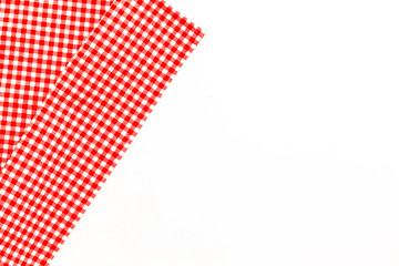 Picnic pattern with red and white dotted tablecloth on white background top view mock up