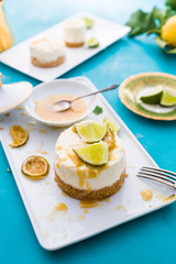 Mojito  cheesecake with rum  and lime syrup, on a rectangualr plate ,flatlay,topview
