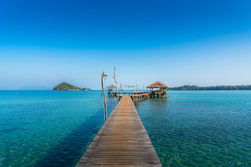Wooden bar in sea and hut with clear sky in Koh Mak at Trat, Thailand. Summer, Travel, Vacation and Holiday concept.