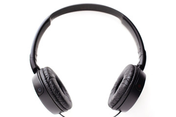 black headphones on a white background, left and right headphones with a frame rim for listening to loud music 