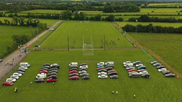4K Fly over shot. Forward movement over a Irish Gaa football field.