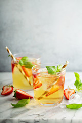 Iced green tea with strawberries and basil