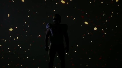 American football player posing against explosion animation on a huge screen. Shot on ARRI Alexa Mini in 4K RAW - Powered by Adobe