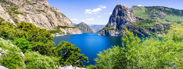 Naklejka na ściany i meble Panoramic view of Hetch Hetchy reservoir; Yosemite National Park, Sierra Nevada mountains, California; the reservoir is one of the main sources of drinking water for the San Francisco bay area