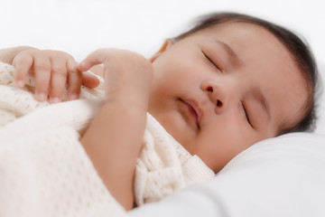 Fototapeta na wymiar portrait of cute asian infant baby boy sleeping