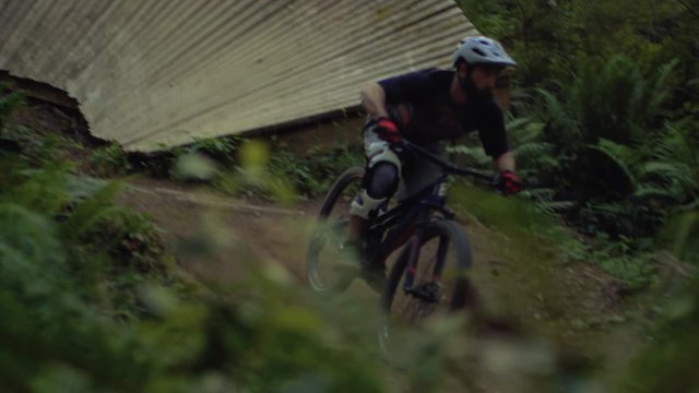 Wood Berm Wall Mountain Bike Shot Slow Motion at Golden Hour
